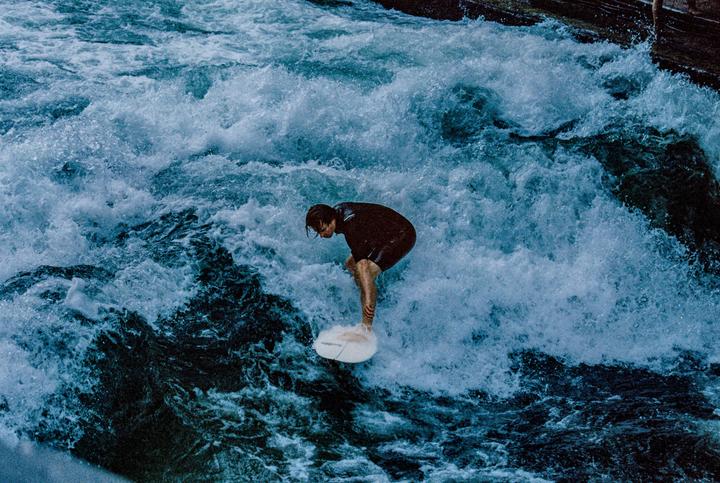 Eisbach Surfing in Munich [Canon EOS 50E, EF 70-210mm f3.5-4.5, Cinestill 800t]