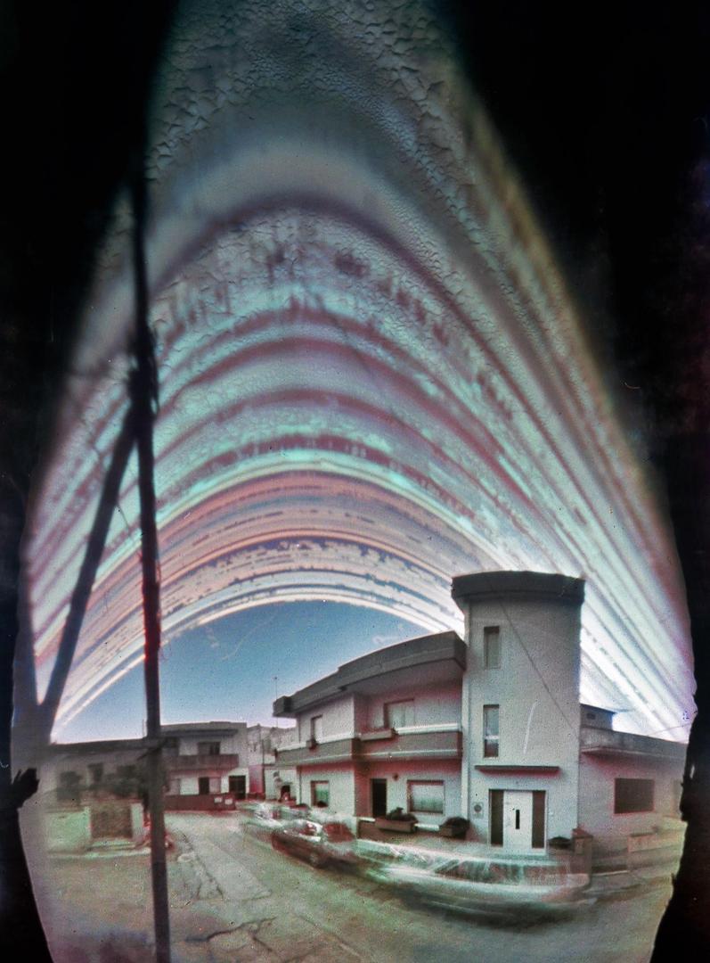 7 months of exposure, with a homemade pinhole camera made from PVC pipes, placed in my house in southern Italy [Homemade Pinhole Camera, Kodak Photo Paper], tagged architecture