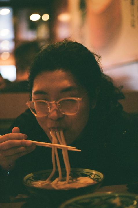 Letting me take my camera to dinner was her first mistake. AE1P - Portra 400