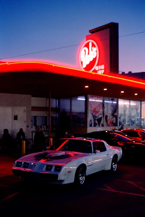 My first roll of film in 12 years and my first-ever roll of color film, developed and scanned myself. I call this one Neon Nights. [Nikon F2, Nikkor-S.C. 55mm f/1.2, CineStill 800T]