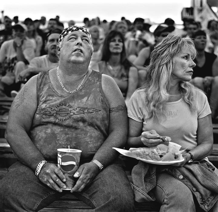 Short track racing fans (Hasselblad 500c, 80mm, Kodak 400 C41 B+W film)
