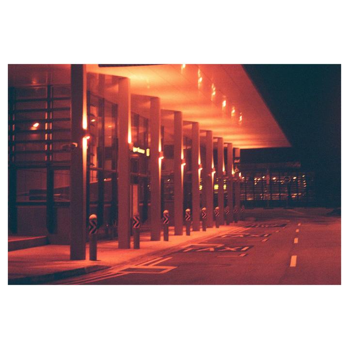 Lonely | Nikon FM2 | 35-70mm | f3.3 | Lomo Redscale | Tiffen Smoque 3