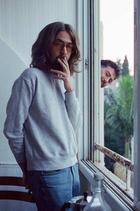 Spring Cigarette and the Neighbour Next Door [Nikon F3, Nikkor 50mm F1.8, Cinestill 800T]