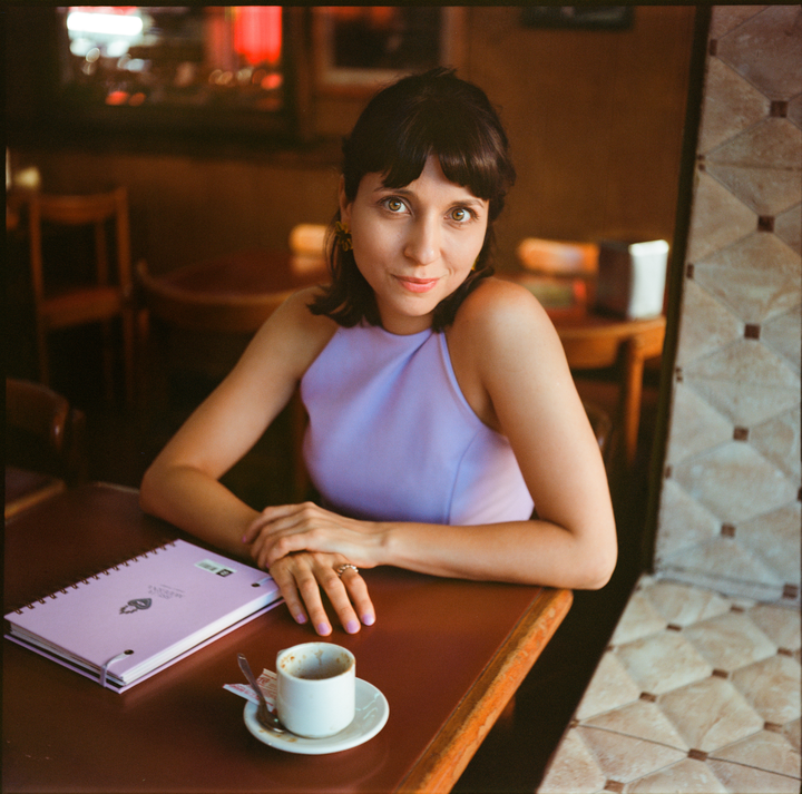 Rocío D in an old bar of Buenos Aires [Iskra-2 soviet 6x6 folder camera + Kodak Ektar 100 (expired 2012)].
