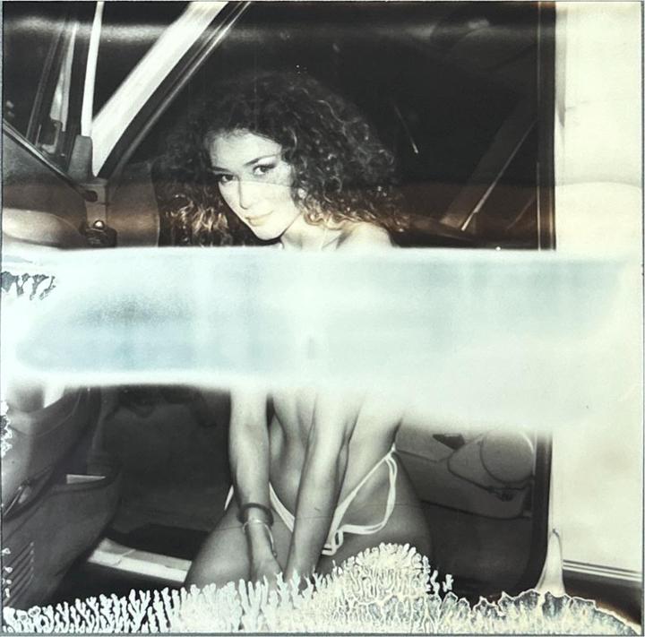Polaroid jammed while ejecting, SX-70, 600 film