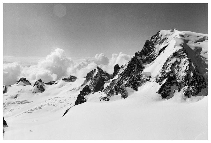 view from the Aguille du Midi (3848m) in the french alps. shot on delta400/Mamiya645 1000s/Yellofilter