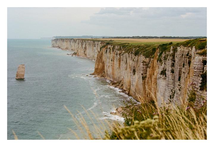 Two favorites from a cliff walk; which works best? | Nikon F6 Portra 400 Polarizer