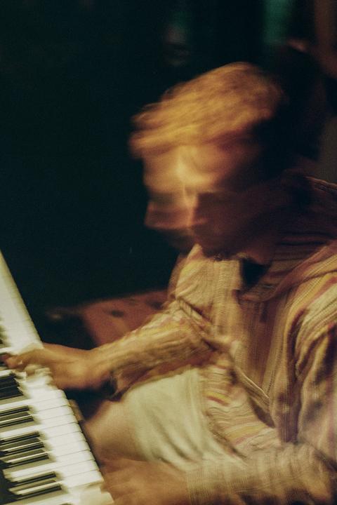 The Pianist [Minolta X-300, 50mm, Gold 200)
