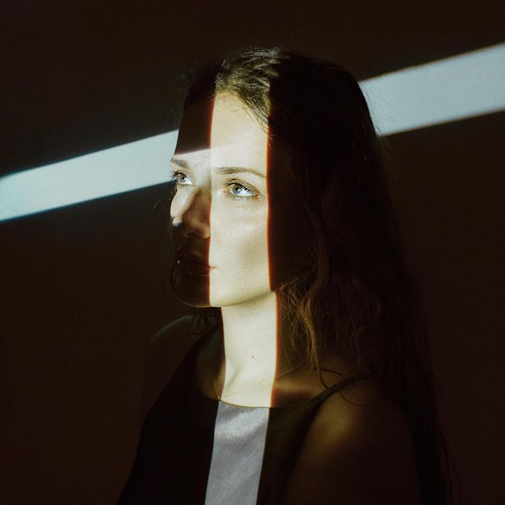 Self-portrait with a projector / Canon AE1 / Ultramax 400 / 50mm 1.4