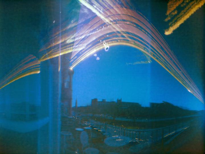 My month and a half long pinhole exposure. Beer can Camera, Ilford paper.