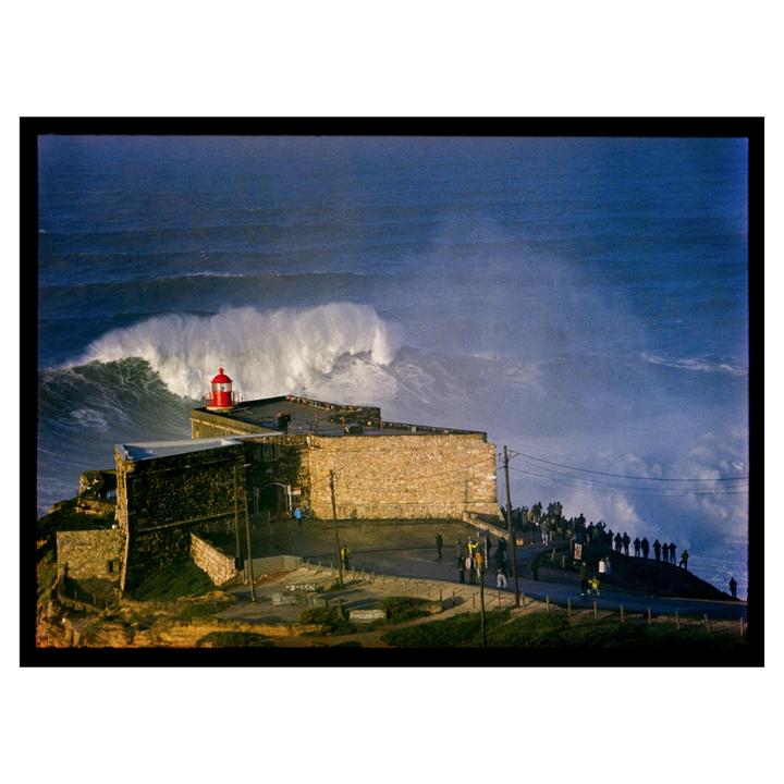 Nazaré winter swell (Portra 400, Olympus pen F with 100mm f3.5)