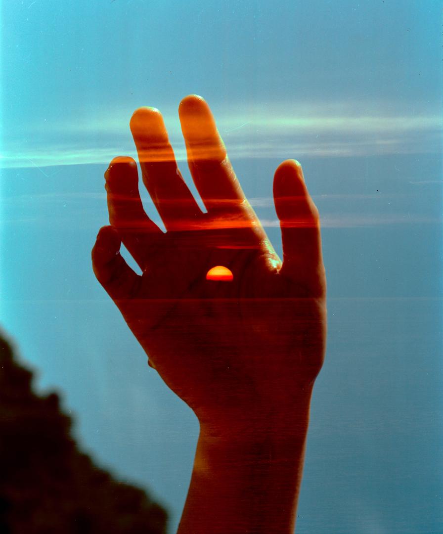Double exposure, tagged hand