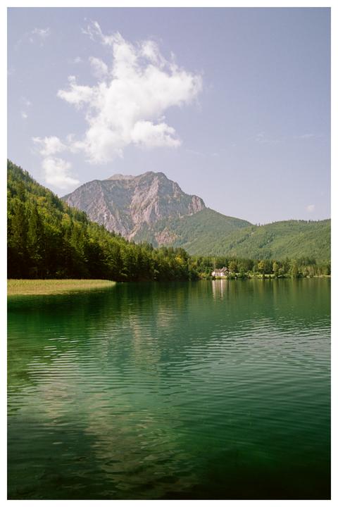 Last clouds dispersing on a hot summer morning [Nikon F100, Portra 400, Circular Polarizer]