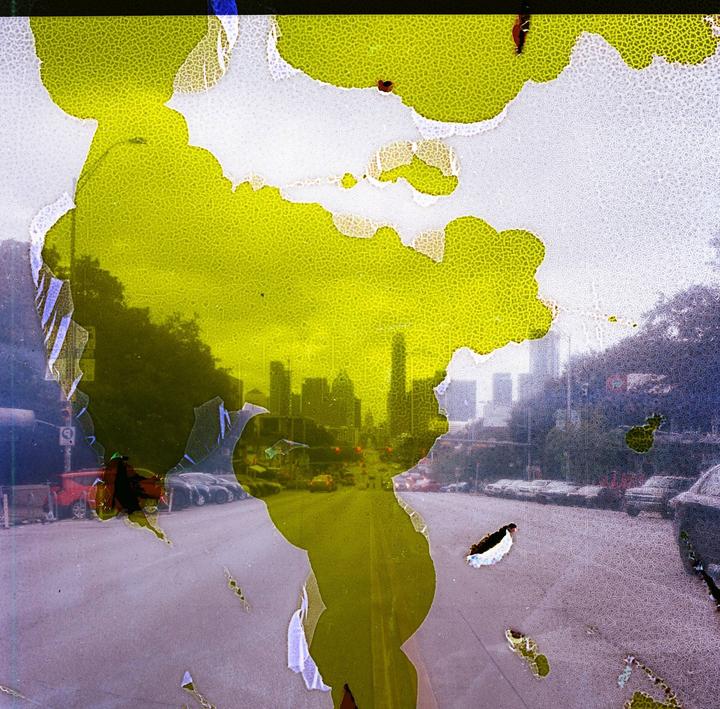 Question: Had this roll developed in the lab. All photos from that roll have this issue. Did they make a mistake in the development or scanning process? Or did I have a light leak issue?