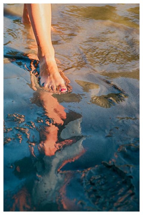 Stepping out of the water during golden hour [Nikon F100, Ektar 100]