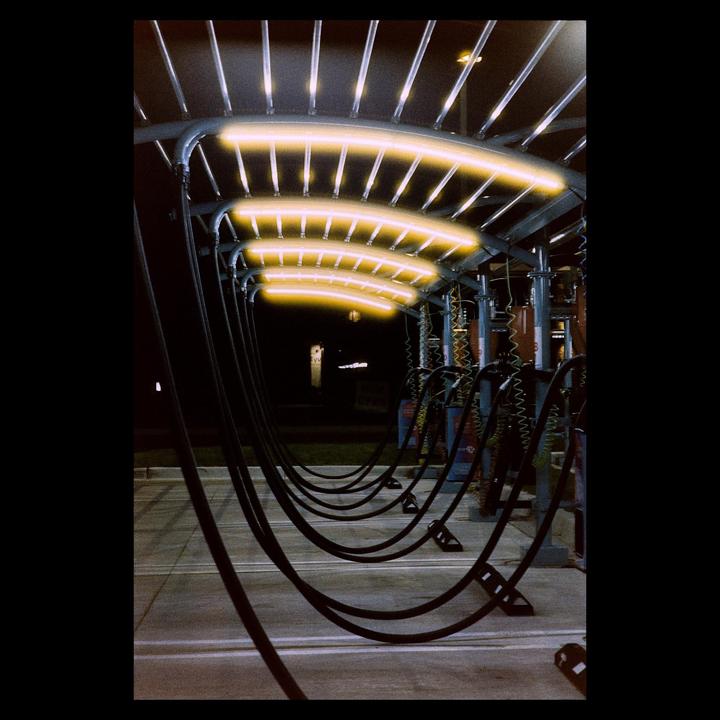 Car wash at night. Nikon FM, 85mm f1.4, Harman Phoenix II.