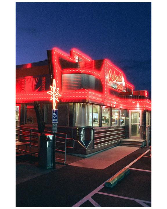Gloria the diner owner tells us tales of the diners origins/ Nikon f/ 35mm 1.4 / Cinestill 800t