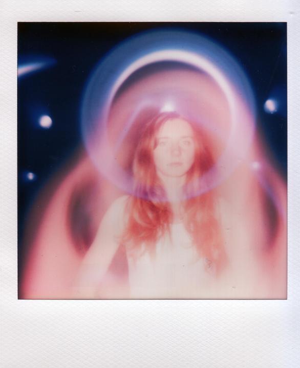Adding weird lenses and filters on a Polaroid 680 camera