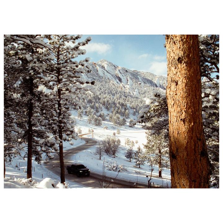 Snowy Flatirons | Nikon FM2, 52mm f/1.8, Cinestill 400d