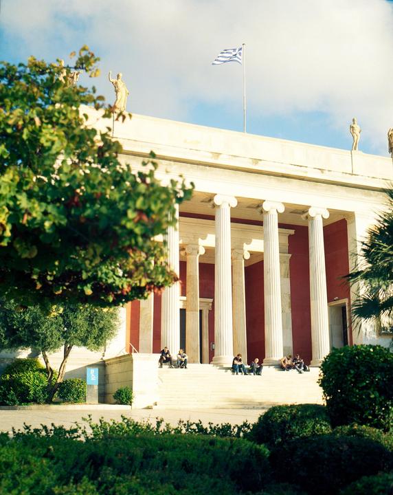 People sitting on the stairs in front of a building in Athens, Greece | Fujica GM670, 100mm, Kodak Gold, self scan
