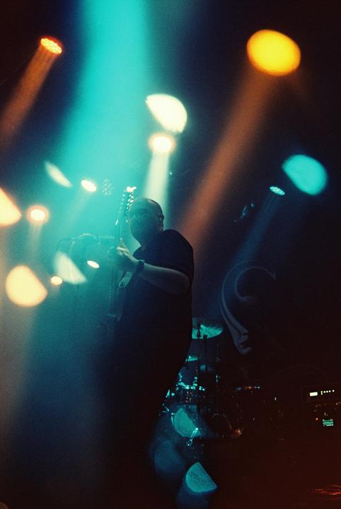 first attempt at taking film photos at a concert (any advice from others who do this more successfully?) [Nikon FE / 35-70mm / Cinestill 800T pushed to 3200]