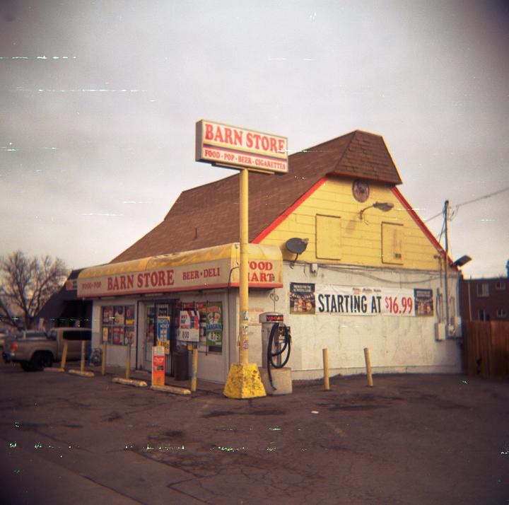 First time shooting on Holga 120cfn, medium format kodak gold 200, cs41 home processed. Any thoughts where the green streaks might have come from?