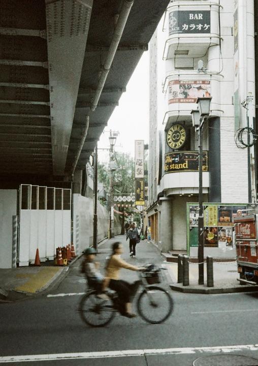 On the go in Shibuya. Canon Demi with Wolfen Orwo 500.