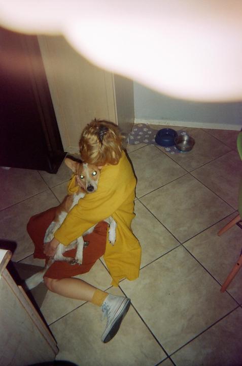 my dog saved my life in 2018 when he protected me from an attempted human trafficking. roommate took this photo of me and my pup about a month before it happened on my canon a-1, portra 800. he passed from cancer in february 2024. despite the imperfection, it's my favorite photo.