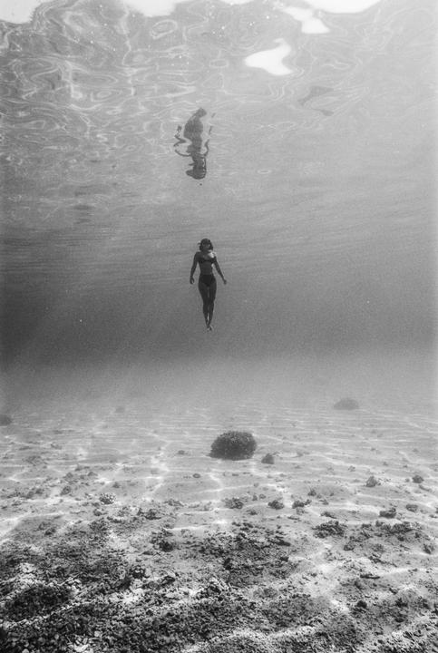 Freediving in some of the clearest water I’ve ever seen in Mexico. Nikonos v tmax400.