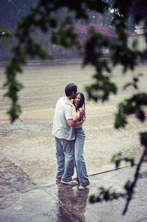 Caught a couple dancing in the rain  [Miranda MS-1 Super, 50mm f/2, Vision3 200T]