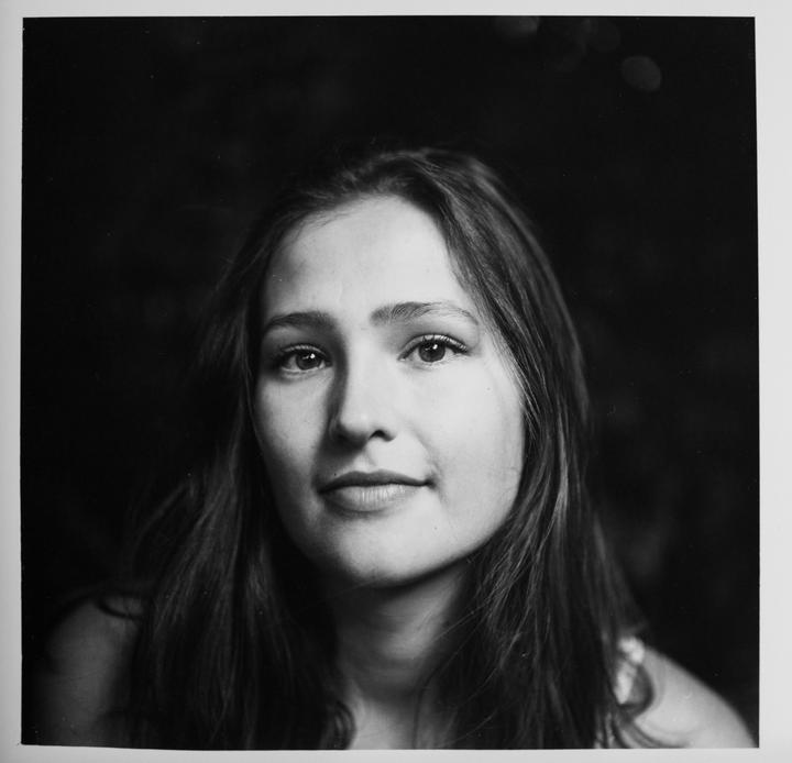 My first portrait darkroom print. Feedback welcome! [Ilford Pan F Plus / Yashica-Mat / Meopta Opemus Standard enlarger / Fujinon EX 75mm f4.5 enlarging lens]