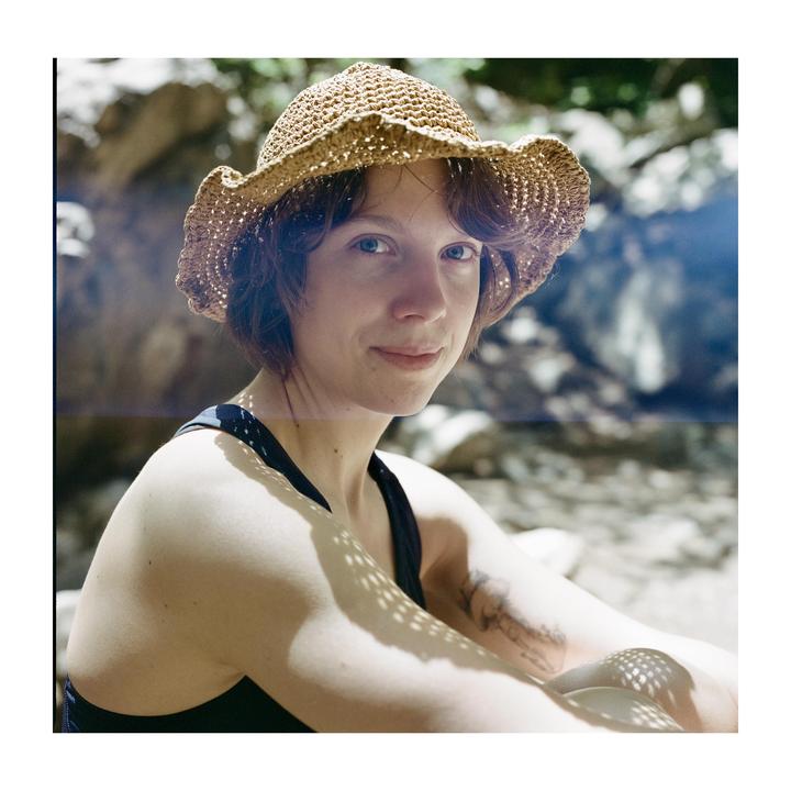 Girl on the tattoo / Bronica SQA with a leak / Kodak Gold 200