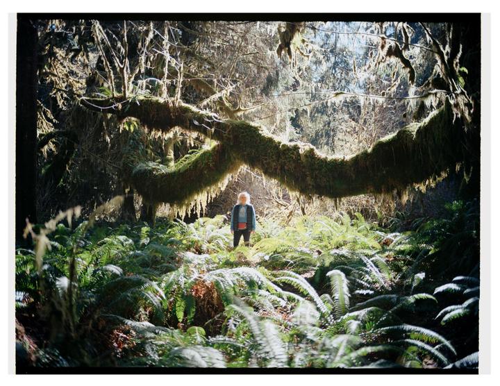 My mom under a massive old growth Maple Tree branch. Mamiya 645 1000s, Ektar 100