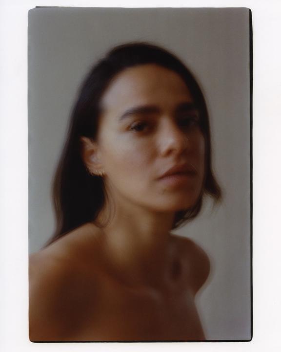 After seeing u/Ze_Lolo's post about taking 16 exposures of a subject on a single frame, I decided to try it with a portrait [Contax RX, 50mm f/1.4, Portra 400]