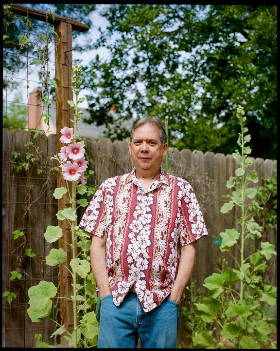 Jim and his favorite flower. [Mamiya RZ67, 110mm, Portra 400]