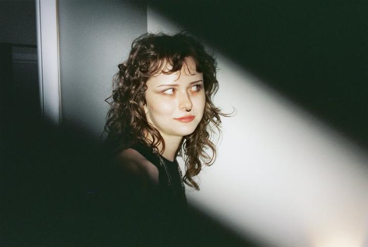 Any idea what would have caused the diagonal flash/borders here? Rollei Prego 145 w/ Cinestill 400