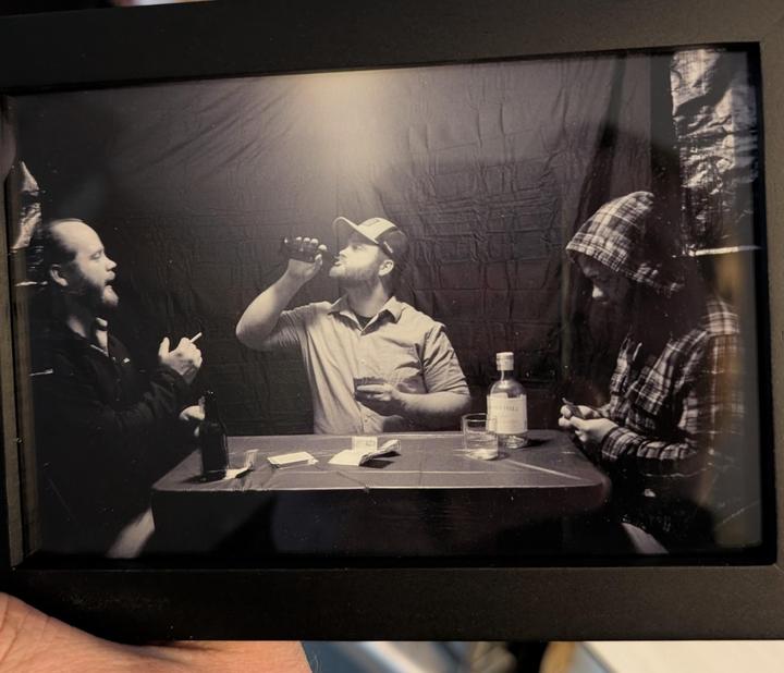 My attempt at recreating a triple exposure picture my father made in the late 70's. "Playing poker with yourself". Using XP2 400 film, a 28mm Minolta lens, a Minolta X-370 camera body, and a very patient wife operating a light switch.