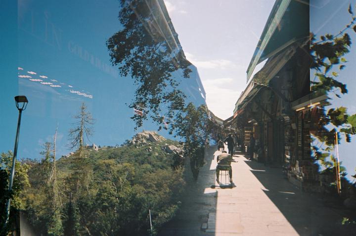 Accidental double exposure, mountains of Sintra and bazaar in Istanbul [Ilford Sprite 35-II, Portra 400]