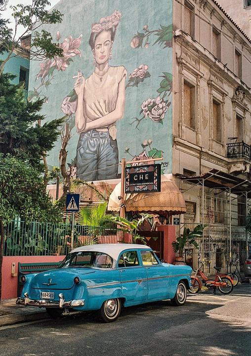 Stumbled across this blue beauty in Athens (Olympus OM10, 35mm f2.8, Portra 800)